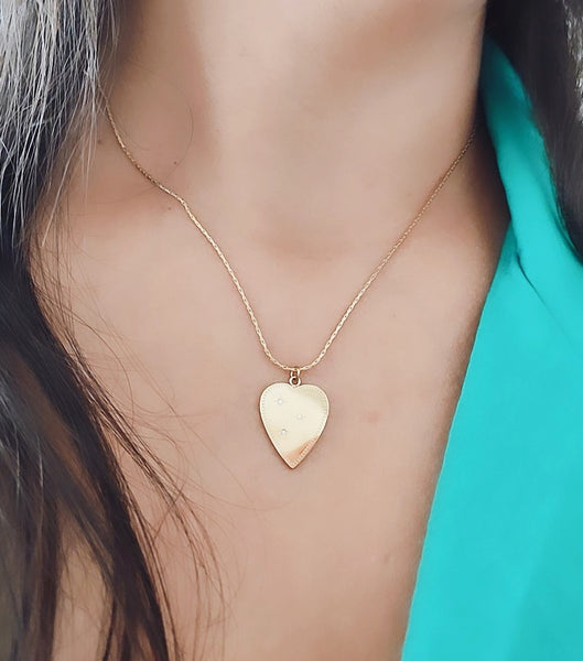 Collier en acier inoxydable pendentif coeur et strass étoilés