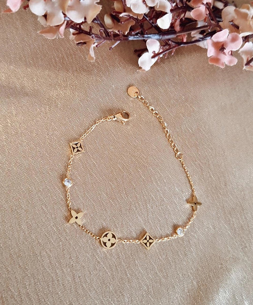Bracelet en acier inoxydable trèfles et strass