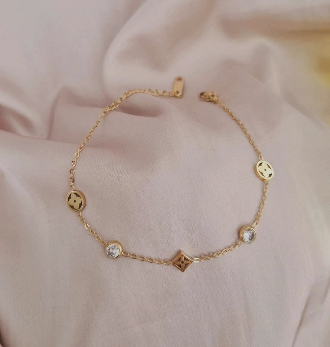 Bracelet en acier inoxydable trèfles et strass