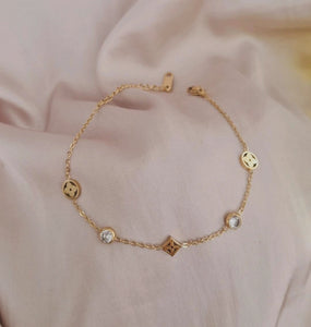Bracelet en acier inoxydable trèfles et strass