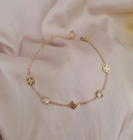 Bracelet en acier inoxydable trèfles et strass