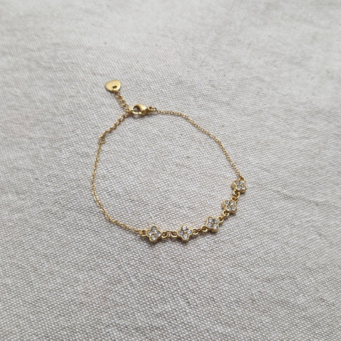 Bracelet ajustable en acier inoxydable multi fleurs et strass