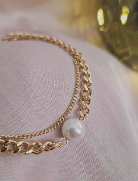 Bracelet en acier inoxydable double chaines avec perle nacrée
