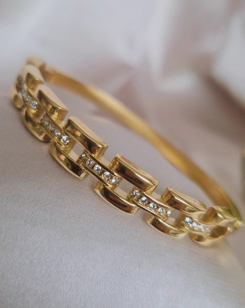 Bracelet jonc en acier inoxydable effet maille et strass
