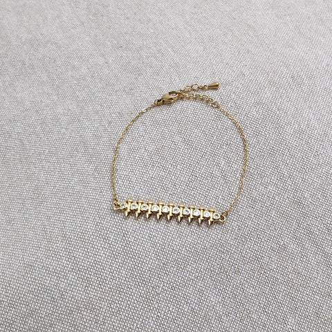 Bracelet en acier inoxydable ligne striée et strass