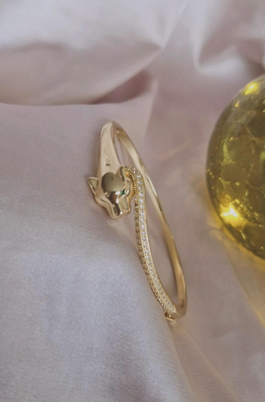 Bracelet jonc jaguar yeux verts strass (vendu à l'unité)