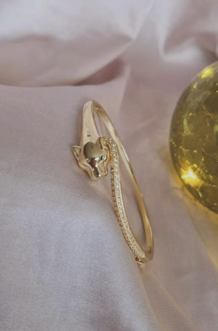 Bracelet jonc jaguar yeux verts strass (vendu à l'unité)