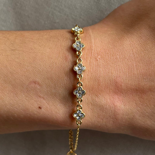 Bracelet ajustable en acier inoxydable multi fleurs et strass