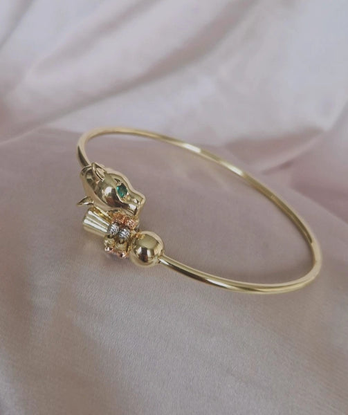 Bracelet jonc panthère yeux verts et perles ajustable