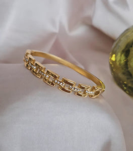 Bracelet jonc en acier inoxydable effet maille et strass