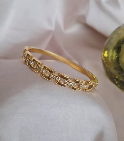 Bracelet jonc en acier inoxydable effet maille et strass