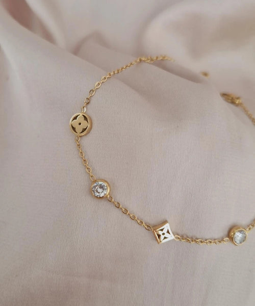 Bracelet en acier inoxydable trèfles et strass