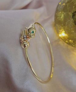 Bracelet jonc panthère yeux verts et perles ajustable