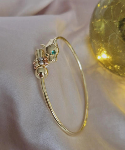 Bracelet jonc panthère yeux verts et perles ajustable